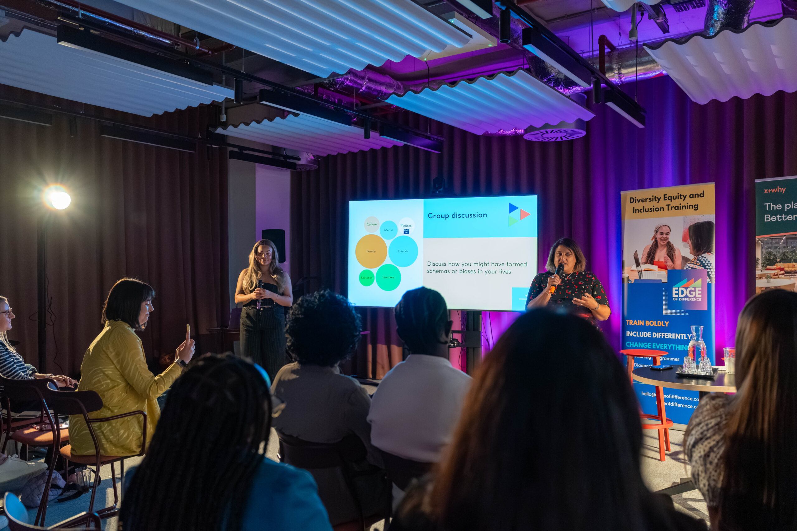 Mo and Kaia presenting to audience